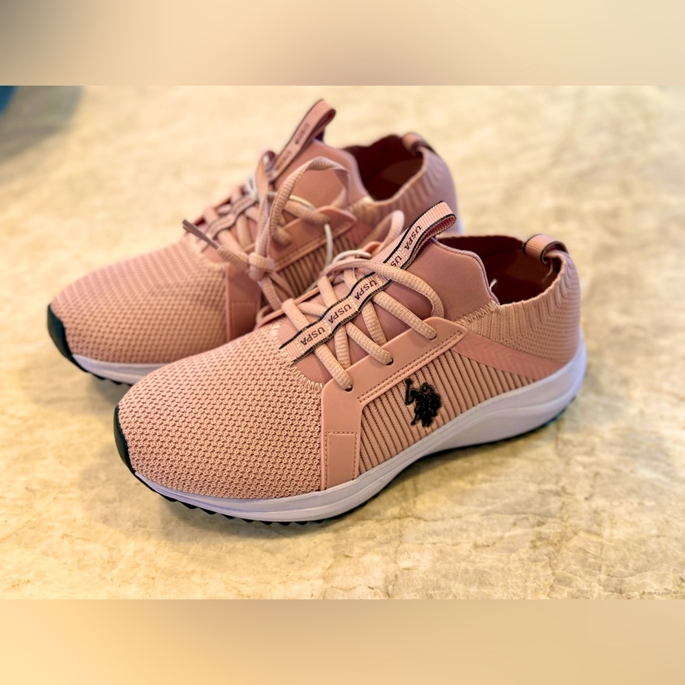 Never been used pink US Polo shoes. Womens size 7, runs small.